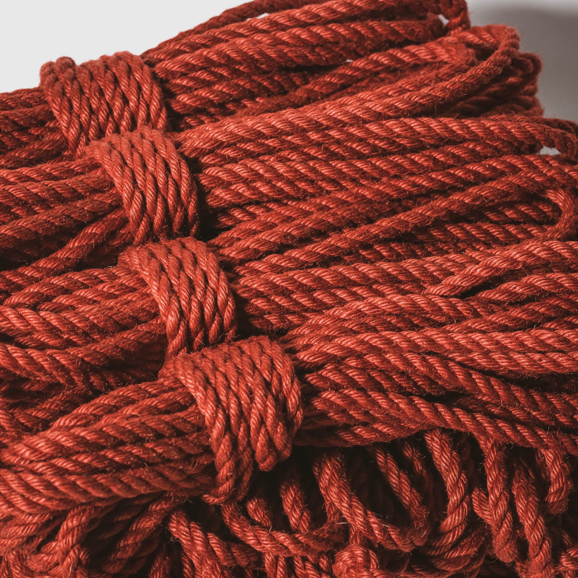 https://eu.shibaristore.com/cdn/shop/products/red-jute-rope-treated-6mm-shibari-rope-317714.jpg?v=1624218257&width=1946